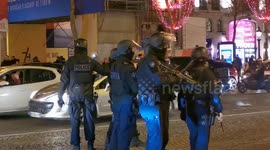 Riot police fire tear gas amid chaos on Paris' Champs-Elysees after Algeria's Arab Cup win
