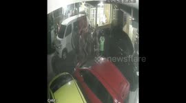 CCTV captures Indonesian locals nabbing a clothing thief as he steals for third day