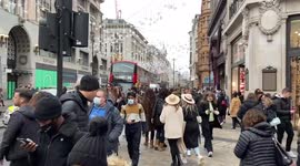 Crowds of people on Oxford Street on a busy weekend, London, UK