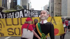 Left-wing protesters march through Sao Paulo demanding impeachment of Bolsonaro