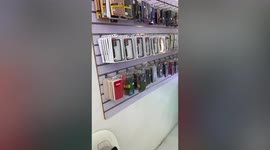 Mobile phone cases in mall shake as magnitude 5.3 earthquake jolts the Philippines