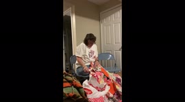 Touching moment US woman reduced to tears after receiving Christmas quilt made from late mother's clothes