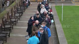 Hundreds queue up at Thomas' Hospital in Central London for vaccine booster shots