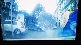 Scared motorists reverse cars as wreath ‘walks’ along road in China