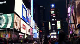 Times Square at holidays time on Manhattan with lights and people
