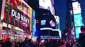 Peoples at evening on busy Times Square between Christmas and New Years Eve