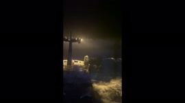 Vessel fishing for crabs battles storm and rough waves in the Bering Sea