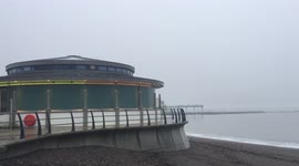 Aberystwyth Bandstand is lit up with rainbow colours after Storm Barra to add rainbow happiness to the seafront.