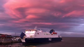 European Highlander departs Larne, Northern Ireland under dramatic sunset sky