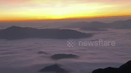 Spectacular sea of clouds cover mountains in chilly northern Thailand