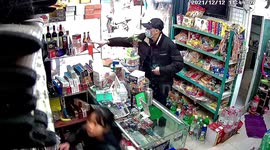 Man pretending to buy water steals box of cigars from shop in central China