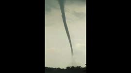 Indonesian farmers watch helplessly as tornado rips through rice fields