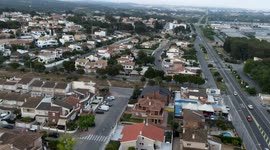 nice hyperlapse in coastal town, with cars and roundabout