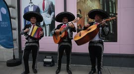 'Jingle Bells' - a Mexican twist! Mariachi band performs on streets of the heart of London, for shoppers as they do Christmas shopping