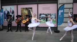 Nutcracker ballerinas and mariachi band greet London shoppers at Piccadilly Circus