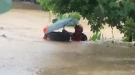 One-month-old baby rescued from super typhoon Rai floods in the Philippines