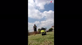 'Trickshot expert does a backflip & sends soccer ball into bucket *MUST-SEE!* '