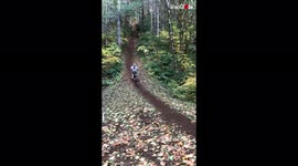 Ouch! US rider knocked off dirt bike by low-hanging branch