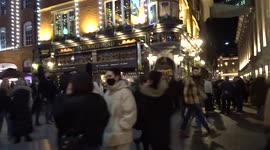 Vibrant atmosphere of festive Covent Garden shining with Christmas lights
