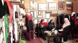 Palestinian women sew traditional heritage embroidery in Gaza city