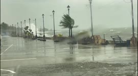 Typhoon Rai batters Philippines with rain and flooding