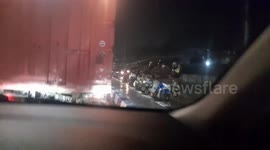 Hundreds of Motorized Vehicles Strike Through Floods on Highway Cikarang, West Java, Indonesia