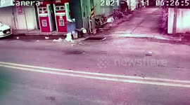 Two Buddhist monks walk by home seconds before bomb blast in southern Thailand