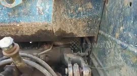 Cobra found keeping warm in farmer’s tractor during cooler winter spell in Thailand