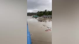 Deep floods caused by super typhoon Rai submerge homes in Bohol, Philippines
