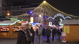 Revellers attend Brussels' Christmas market despite spike in COVID-19 cases