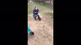 'Young boy almost goes FULL SCORPION after falling off bicycle 
'