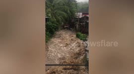 Super typhoon Rai floods rage through village in southern Philippines