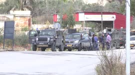 Israeli soldiers stand between settlers and Palestinian residents of the West Bank village of Burqahafter reported attacks by Israeli settlers on the village, in the West Bank city of Nablus.