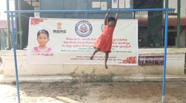 Spider girl of South India - A Toddler hangs on monkey bar for 87 seconds and places in record books.