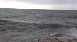Strong winds blow through lake. The strong winds arrive in the late morning and continued into the early evening.