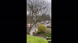 Ice cream truck funeral procession drives through London