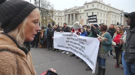 Anti Vaccination Protesters March Through London Holding Banners