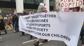 Thousands of Anti Vaccination Protesters March Through London With Banners