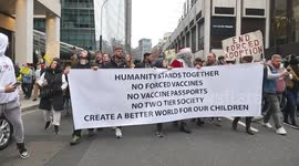 Santa Leads Thousands of Anti Vaccination Protesters Through London