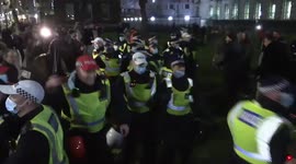 Police are forced to retreat as they lose control of the crowd during End Covid Restrictions Protest - London