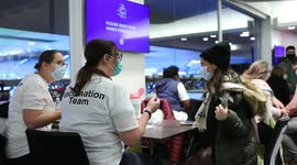 A girl seen receiving her jab by a member of the NHS vaccination team, following pre-vaccination questionnaire