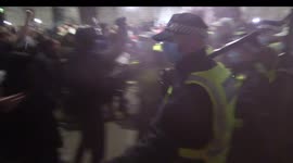 Officer has bottle smashed on head as London police fight anti-lockdown protesters