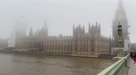 Dense fog covers Houses of Parliament and Big Ben in London