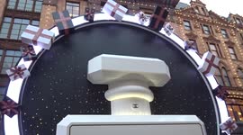 Harrods entrance adorned with Chanel No 5 installation - Hans Crescent