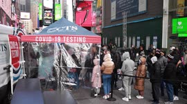 New Yorkers line up for Covid-19 tests in Times Square and on the Upper West Side as case volumes spike