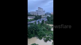 Evacuations issued as floods sweep across Malaysia after torrential rain