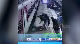 Man rescued after almost slipping underneath moving train in central India