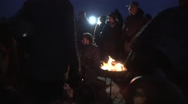 Crowds gather at the Glastonbury Tor to celebrate the winter solstice