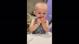 Russian baby loves onions, but can't hold back the onion tears