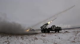 Russian military flexes muscles with display of artillery, air combat and tanks